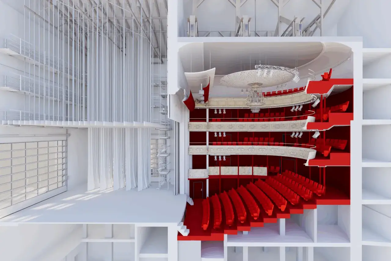 Przekr&oacute;j teatralny z czerwonymi fotelami i bogatymi zdobieniami. Czego nie widać, to zaplecze techniczne i konstrukcja sceny.