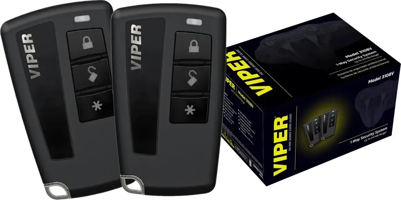 Dwa piloty Viper z funkcją keyless entry i keyless go, obok pudełka systemu alarmowego.