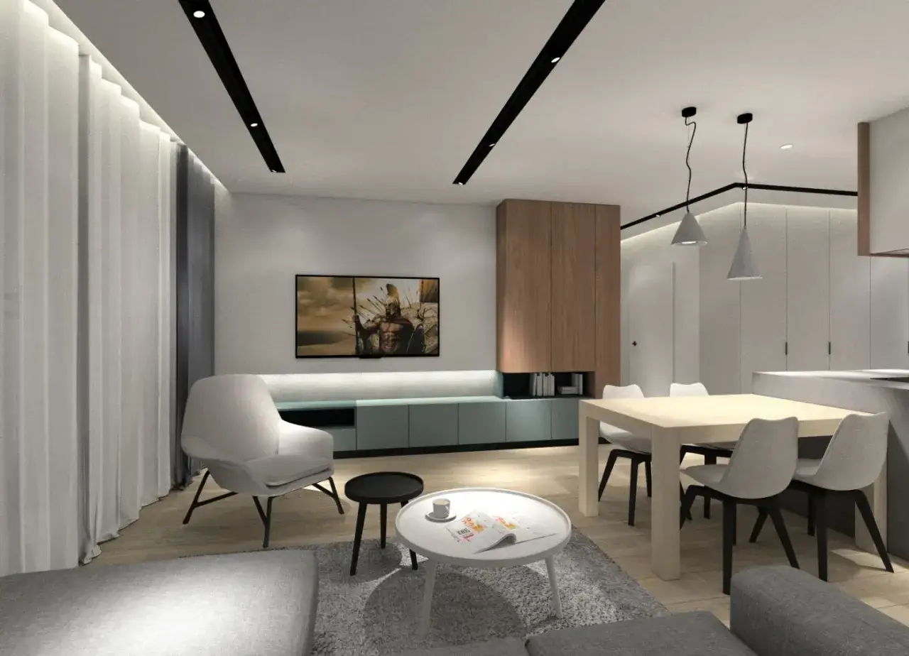 Nowoczesny salon z jadalnią. W centralnym punkcie znajduje się telewizor, nad którym zamontowano dyskretne halogeny.