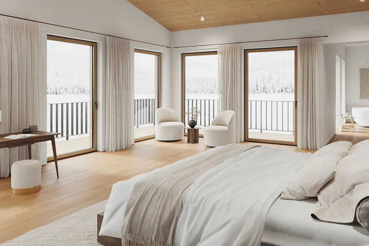 Sypialnia z widokiem na zimowy krajobraz, przez duże okna dąb naturalny. Dwa fotele, łóżko i biurko.