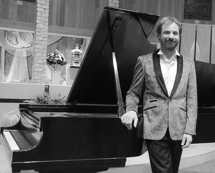 Zdjęcie Michał Musioł tenor – niezwykła kariera i osiągnięcia w muzyce