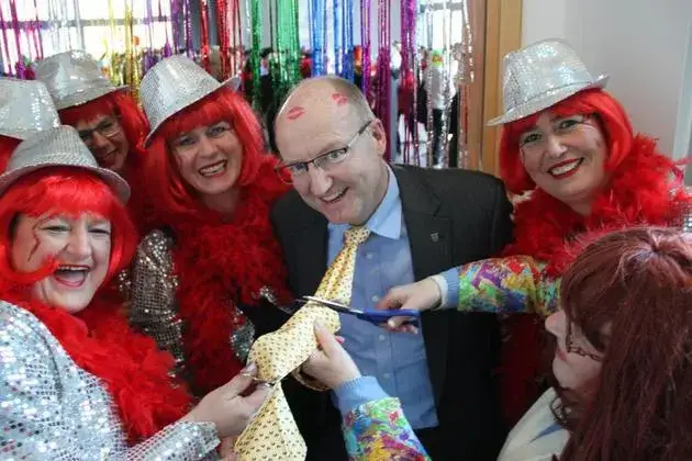 Weiberfastnacht women cutting ties