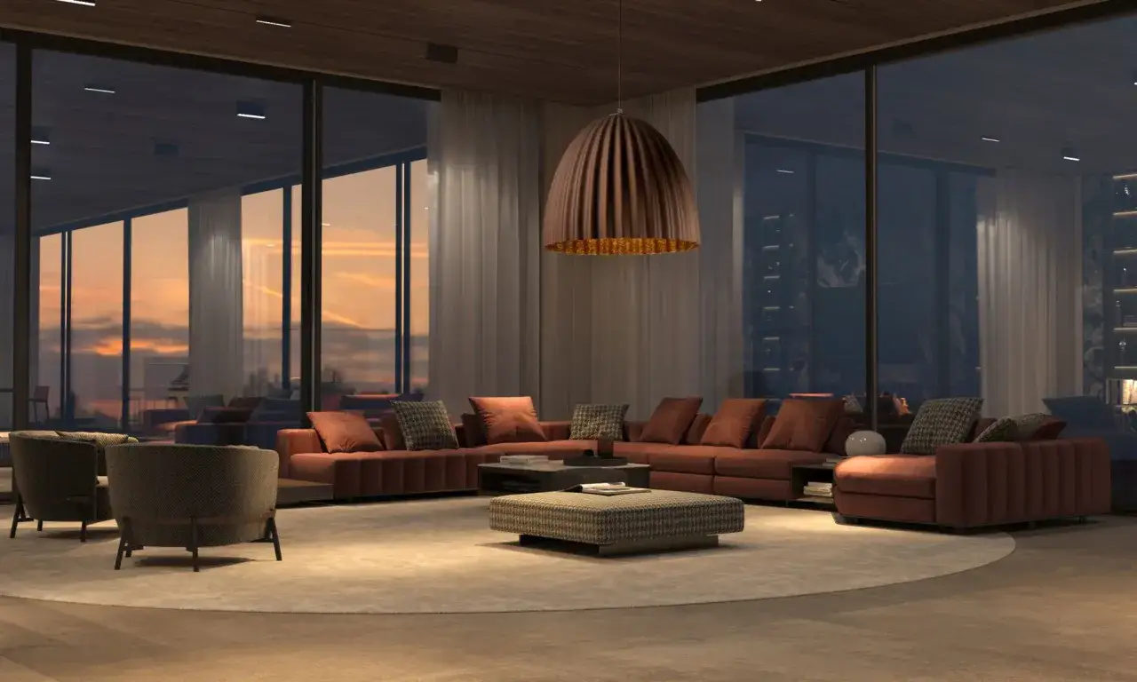 Nowoczesne oświetlenie wysokiego salonu tworzy przytulną atmosferę. Duże okna ukazują zach&oacute;d słońca, a w centrum znajduje się wygodna, brązowa kanapa.