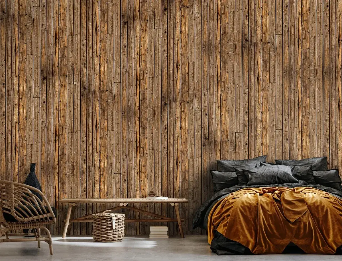 Tapeta stare deski tworzy przytulną atmosferę w sypialni. Drewniane deski dodają ciepła i naturalnego charakteru.