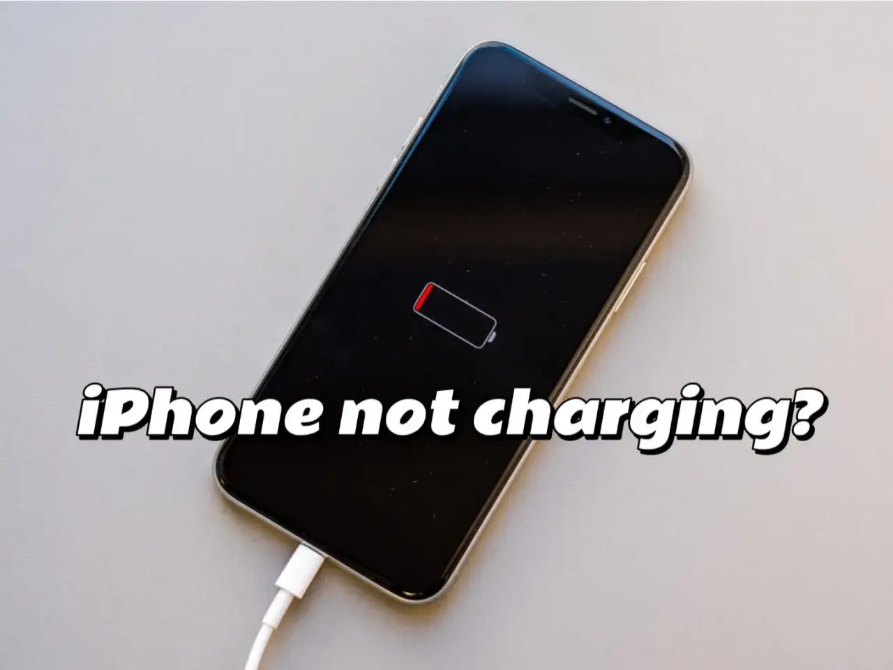 iPhone widzi ładowarkę, ale nie ładuje. Ikona baterii jest czerwona i pusta.