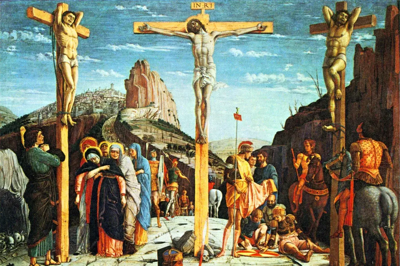 Scena ukrzyżowania Jezusa i dwóch łotrów. W tle miasto i góry. Wokół krzyży zgromadzeni ludzie, żołnierze i Matka Boska. To moment śmierci Jezusa.