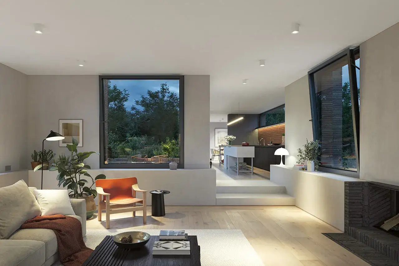 Nowoczesny salon z dużymi oknami, z których widać ogród. Wysokość okna od podłogi jest optymalna, by podziwiać zieleń.