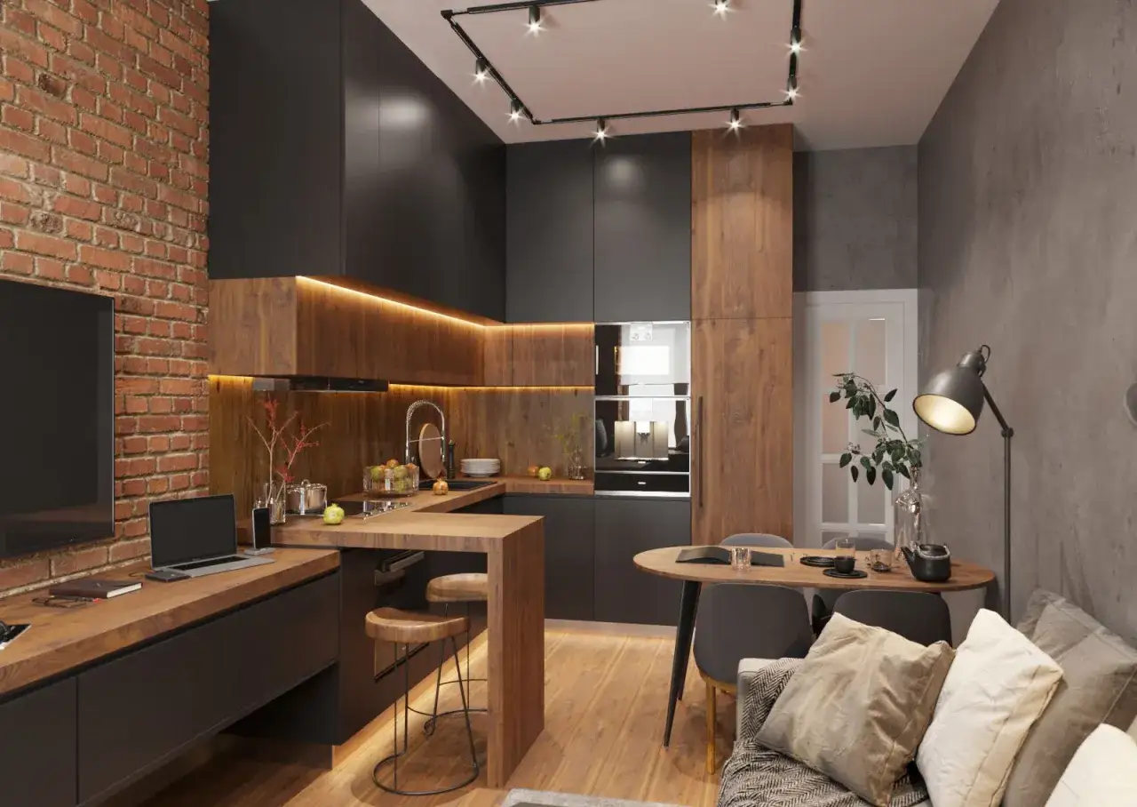 Nowoczesna aranżacja mieszkania 50m2 w bloku: kuchnia z drewnianymi frontami, ceglana ściana, wyspa kuchenna i st&oacute;ł jadalniany.