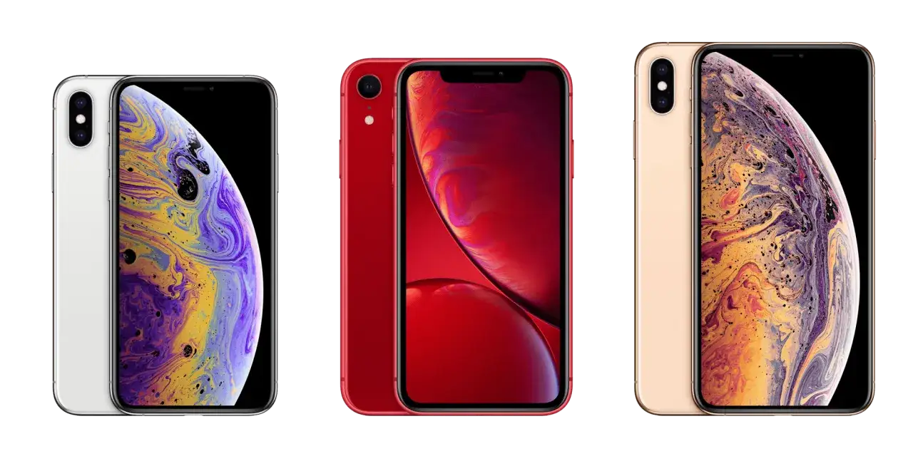 Trzy iPhone'y: biały, czerwony i złoty. Złoty iPhone XS Max ma wymiary idealne do dłoni.