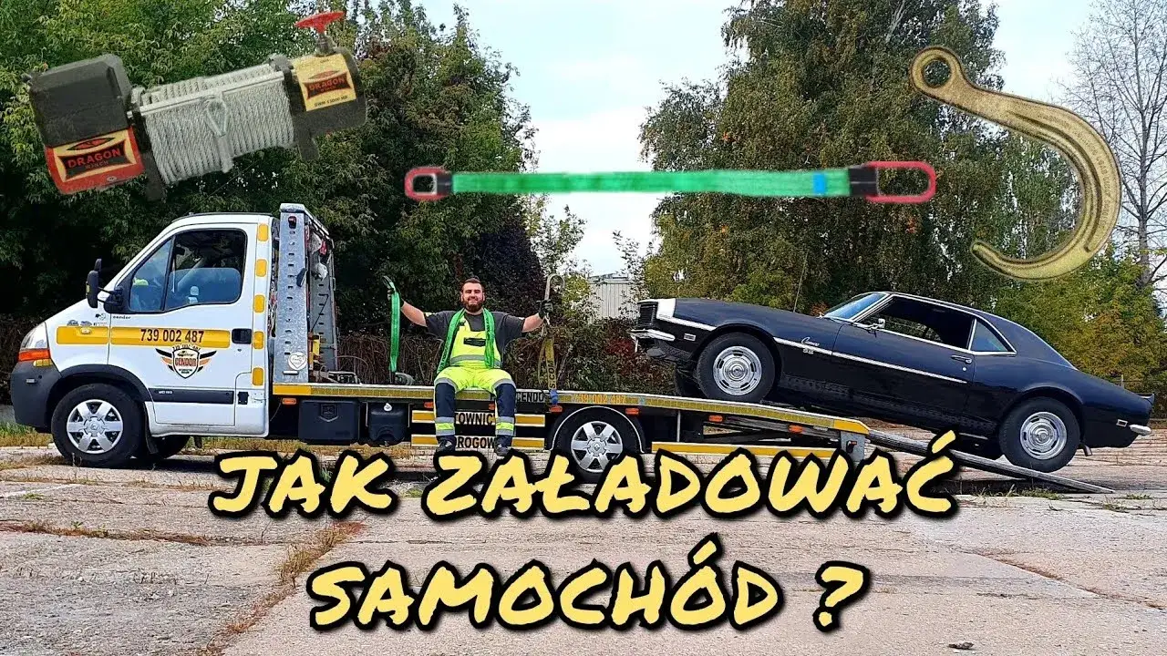 samochód ładowany na lawetę