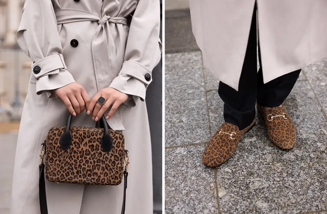 Elegancki trencz i czarne spodnie, a do tego torebka i mokasyny w panterkę. Stylizacja z pazurem!
