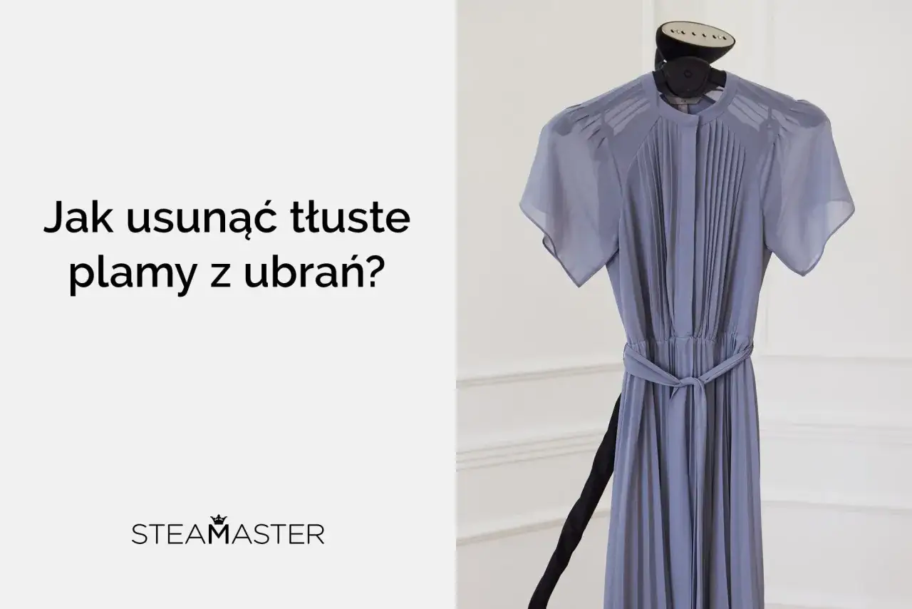 Jak usunąć stare tłuste plamy z ubrań? Szara sukienka na wieszaku, obok parownica.