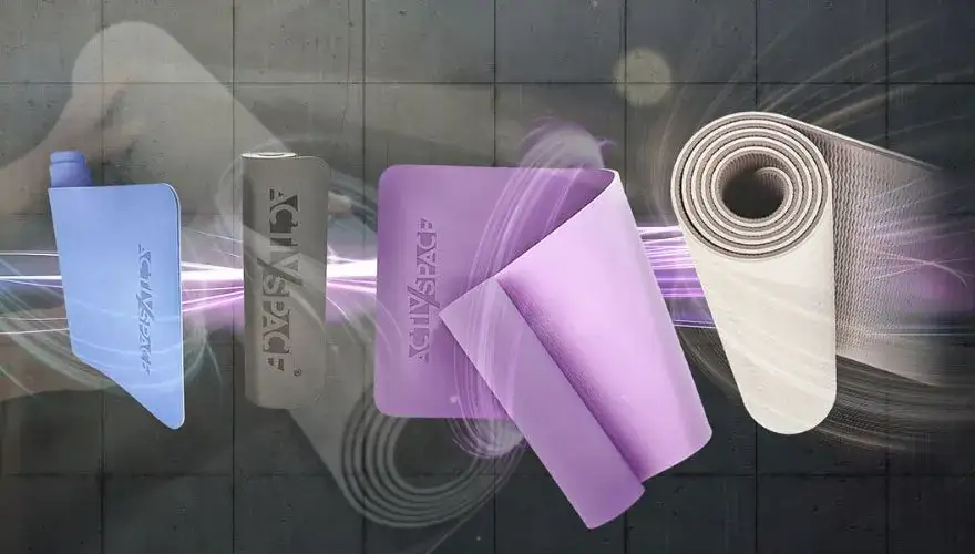 Zbliżenie na r&oacute;żne tekstury i materiały mat do ćwiczeń (NBR, TPE, kauczuk)
