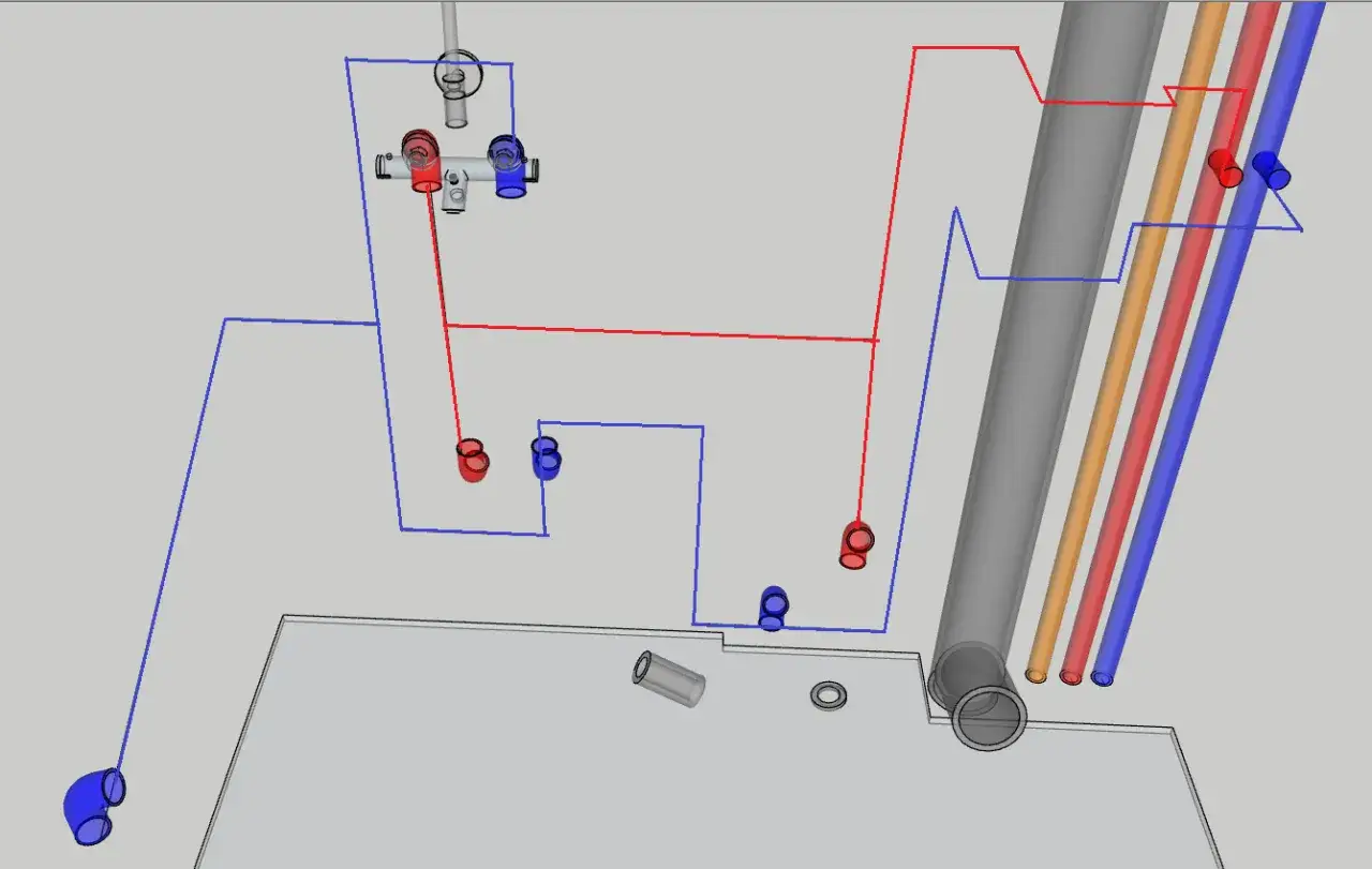 Schemat instalacji wodnej PEX z rurami ciepłej (czerwone) i zimnej (niebieskie) wody, pokazujący rozkład przyłączy.