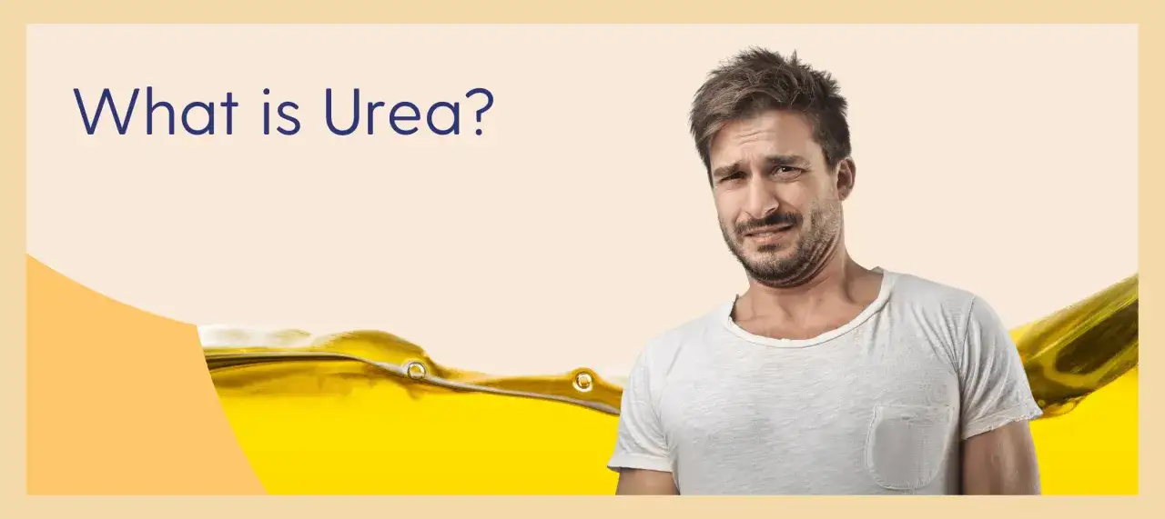 Mężczyzna z grymasem na twarzy obok ż&oacute;łtej cieczy. Pytanie 