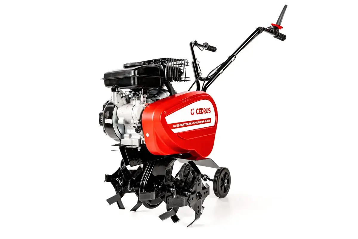 Czerwona glebogryzarka spalinowa Cedrus z czarnymi elementami i obracającymi się nożami, gotowa do pracy w ogrodzie.