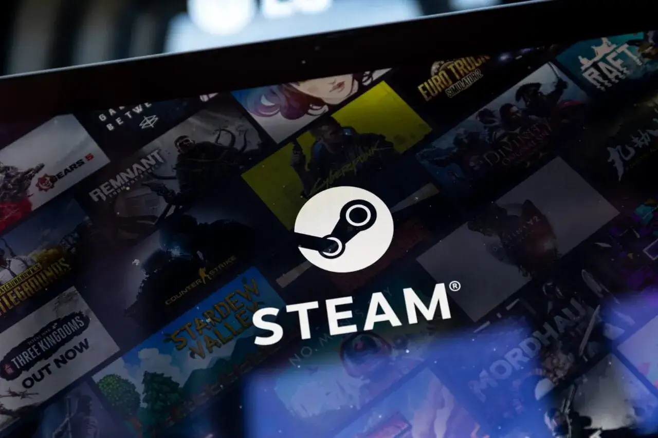 Ekran Steam z logo i okładkami gier. Dowiedz się, jak udostępniać gry na Steam, aby dzielić się zabawą ze znajomymi.