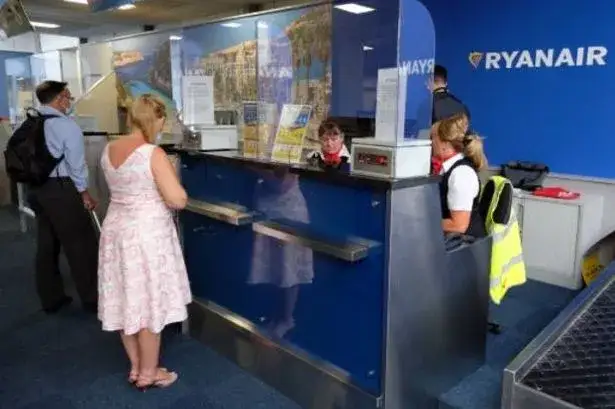 Ryanair check-in desk airport fee