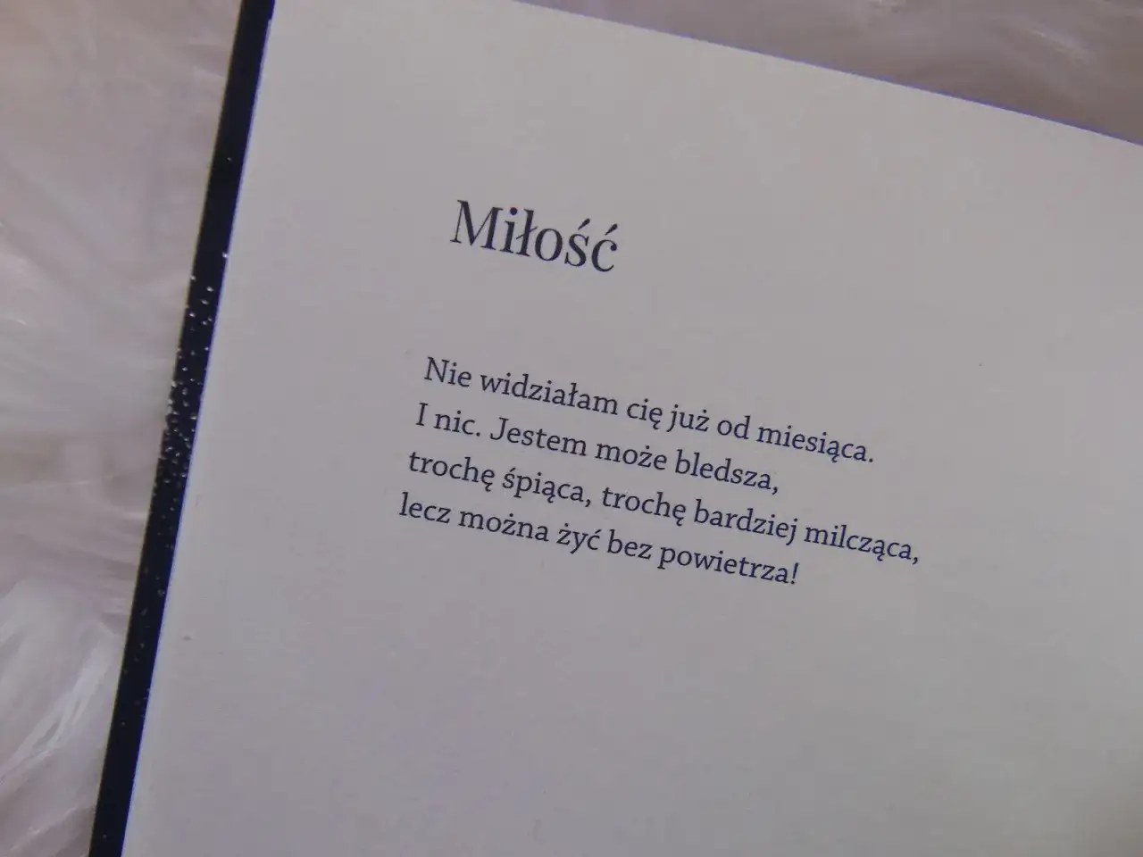 Fragment książki z wierszem 