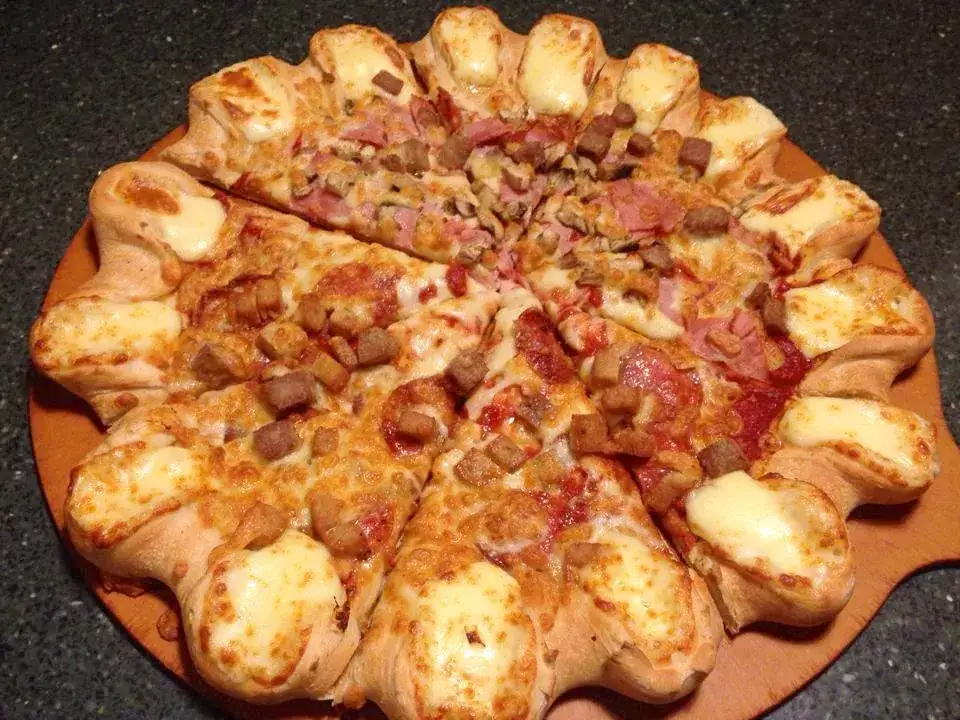 Zdjęcie Ile waży duża pizza w Pizza Hut? Zaskakujące fakty o wadze pizzy