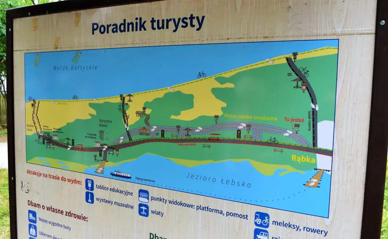 Poradnik turysty: mapa Łeby z atrakcjami, szlakami pieszymi i rowerowymi, punktami widokowymi i informacjami o Jeziorze Łebsko.