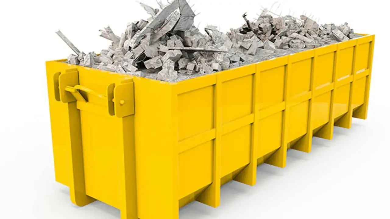 Ż&oacute;łty kontener na gruz budowlany, idealny do odpowiedzi na pytanie: gdzie wyrzucić tapetę i inne odpady po remoncie.