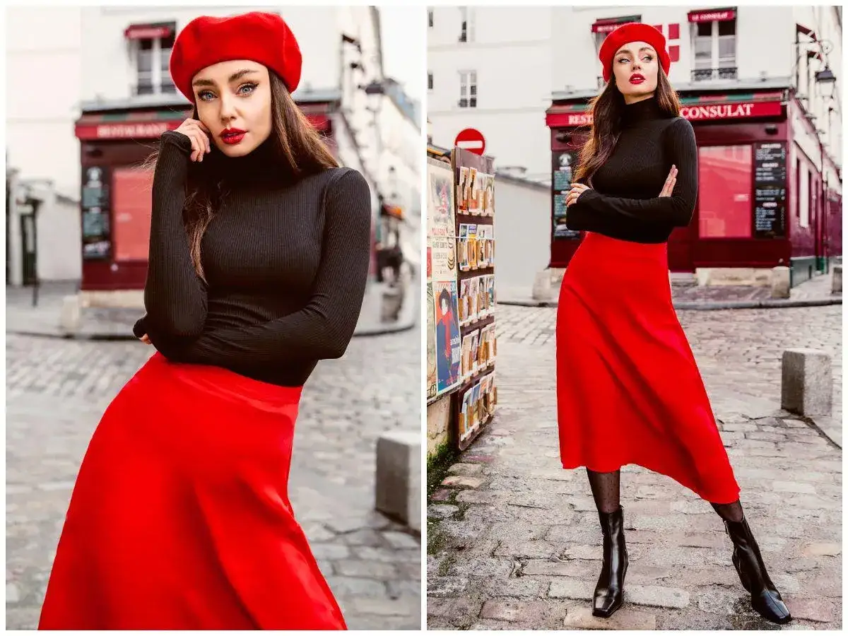 Elegancka kobieta w czerwonym beretcie i czarnym golfie, z czerwoną spódnicą. Inspiracja dla mody dla 50 latki.