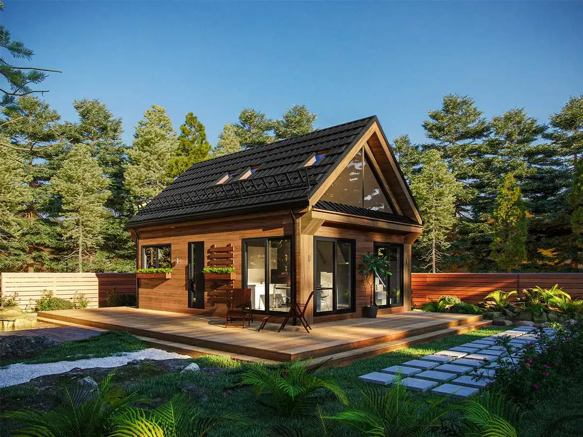 Nowoczesny, drewniany dom modułowy otoczony lasem. Odpowiedź na pytanie: czy domy modułowe są trwałe? Tak, ten dom wygląda na solidny i trwały.