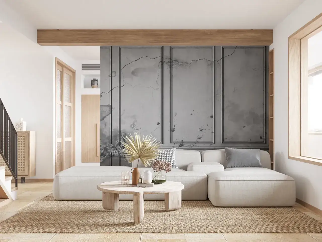 Nowoczesny salon z szarą ścianą z efektem betonu, co zamiast lameli. Miękka, modułowa sofa i okrągły stolik kawowy.