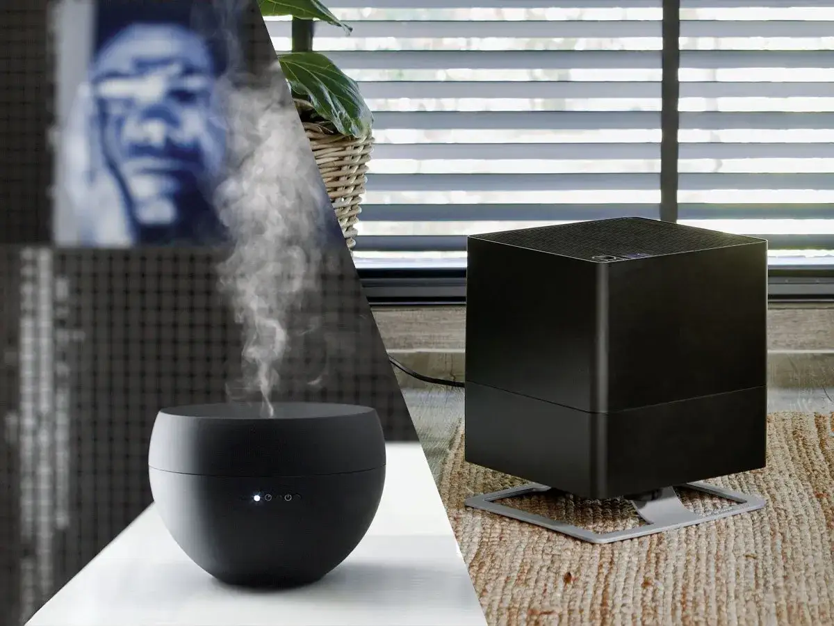 Dwa czarne nawilżacze powietrza: jeden kulisty z mgiełką, drugi sześcienny. Pytanie: czy do nawilżacza można wlać olejek?