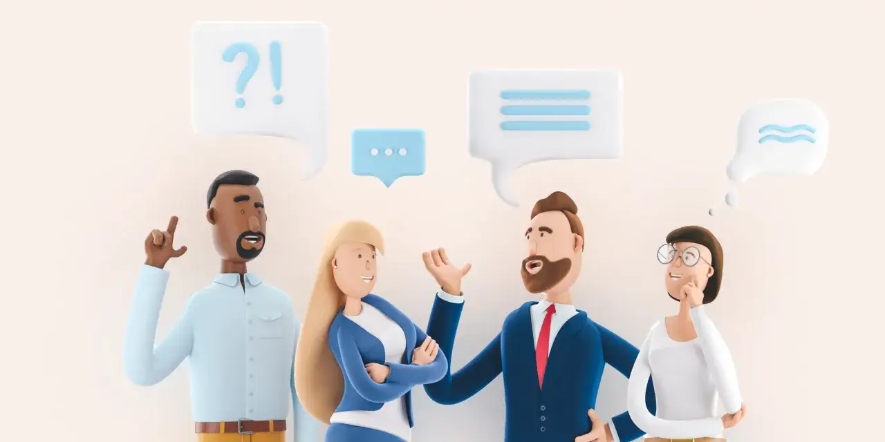 Ludzie rozmawiają, jeden zadaje pytania, inny słucha uważnie. To pokazuje cechy dobrego słuchacza: zainteresowanie i chęć zrozumienia.