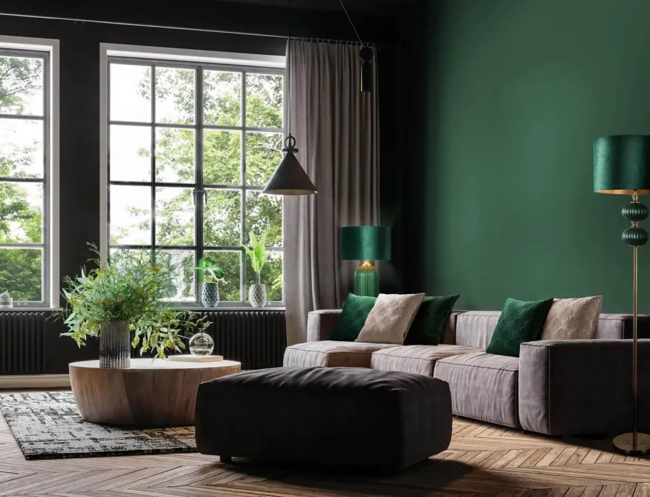 Męski pok&oacute;j inspiracje: elegancka szara sofa, ciemnozielone ściany, drewniany stolik i stylowe lampy tworzą przytulną atmosferę.