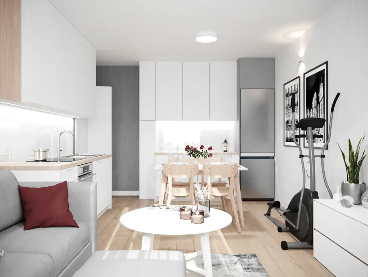 Nowoczesne mieszkanie 40m2 rzut: kuchnia, jadalnia, salon z kanapą i orbitrek.