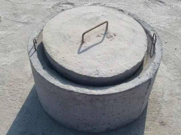 Zdjęcie Kominek betonowy do szamba: funkcje i cechy kluczowego elementu