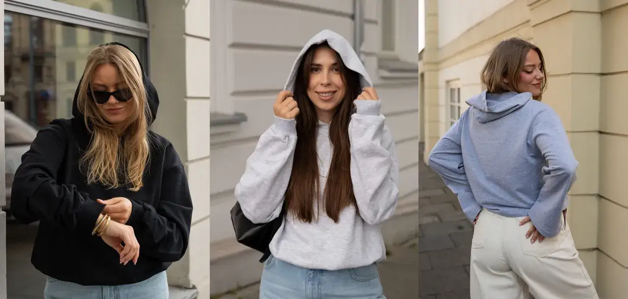 Trzy kobiety w bluzach z kapturem i jeansach. Idealny outfit, jak się ubrać na koncert hip hopowy.
