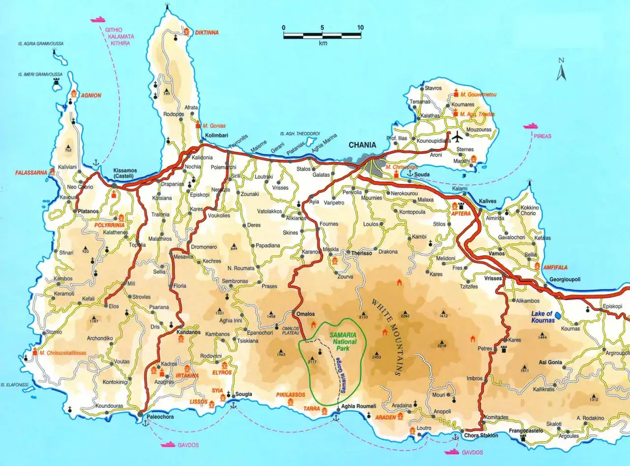 Mapa Krety z zaznaczonymi drogami, miastami i górami. Widać tu podział na zachodnią i wschodnią część wyspy, z Samarią jako centralnym punktem.