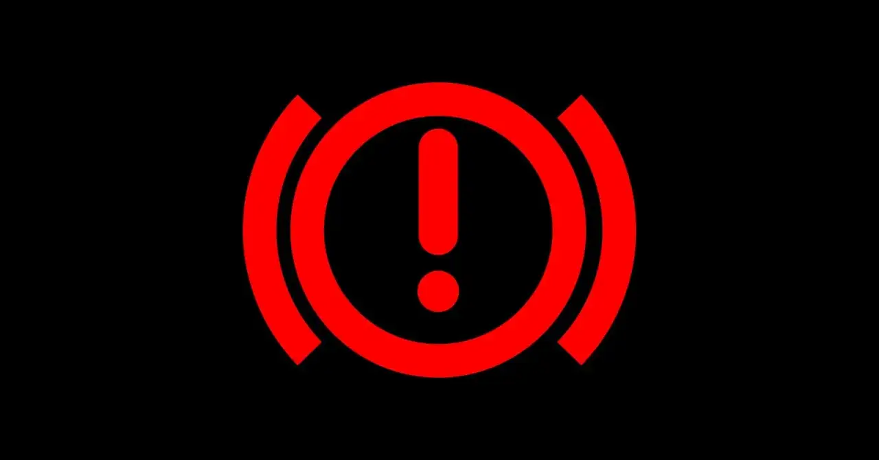 Czerwona kontrolka k&oacute;łko z kreskami i wykrzyknikiem. Sygnalizuje problem z hamulcami.