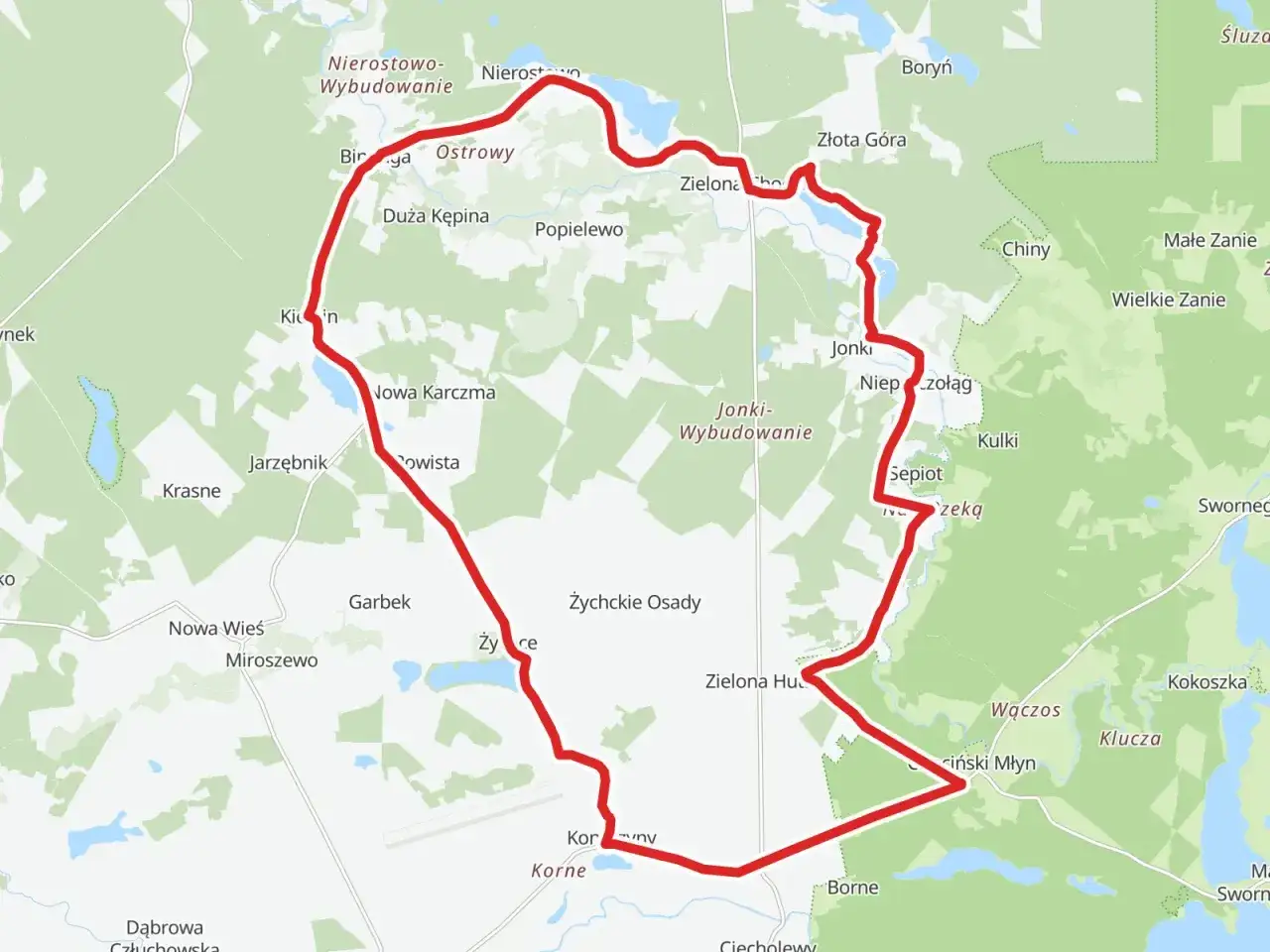 Mapa z zaznaczonymi trasami rowerowymi w Polsce, prowadzącymi przez malownicze tereny z jeziorami i lasami.