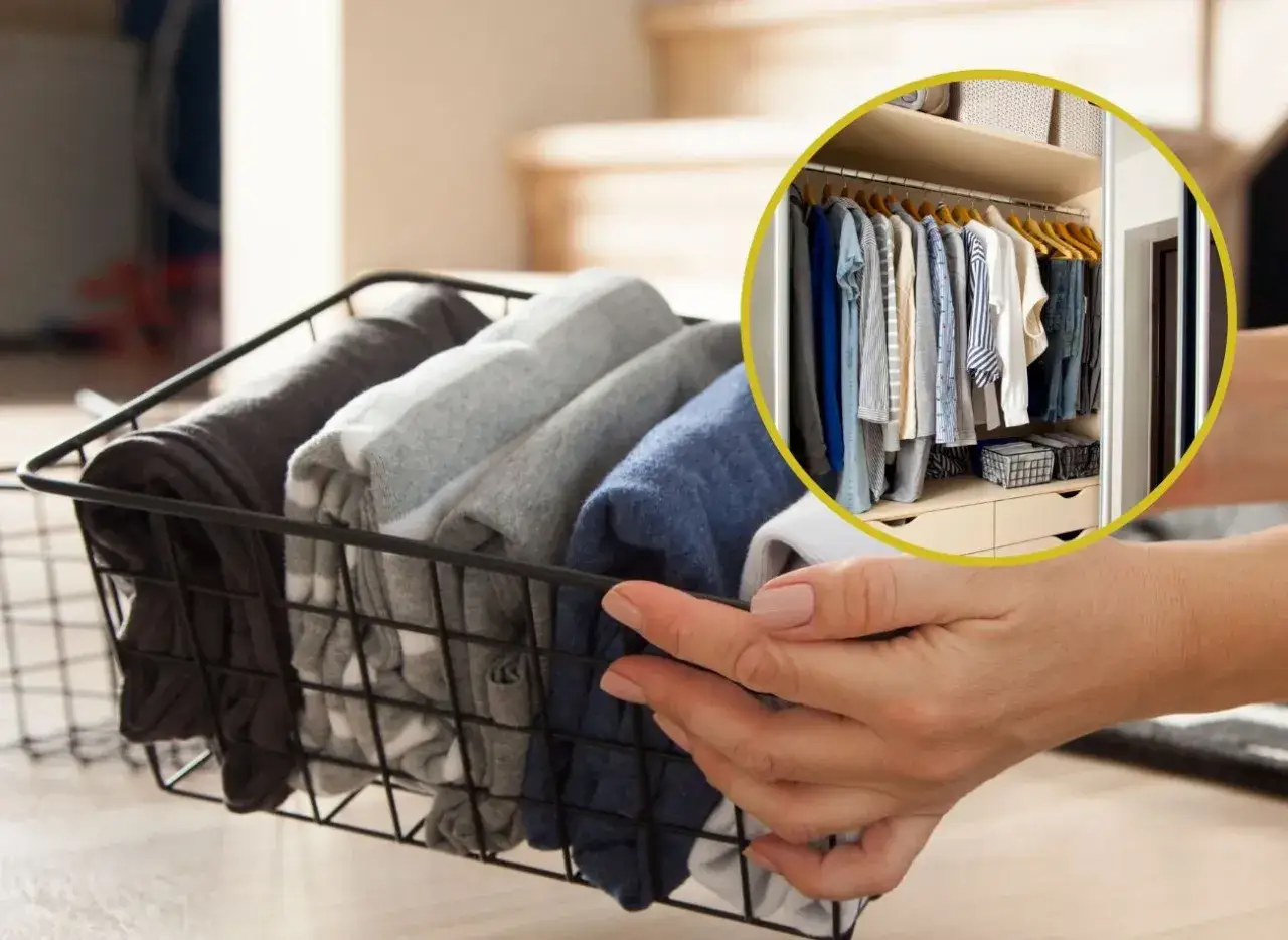 Uporządkowana szafa po zastosowaniu metody KonMari. Koszyk z ubraniami złożonymi pionowo.