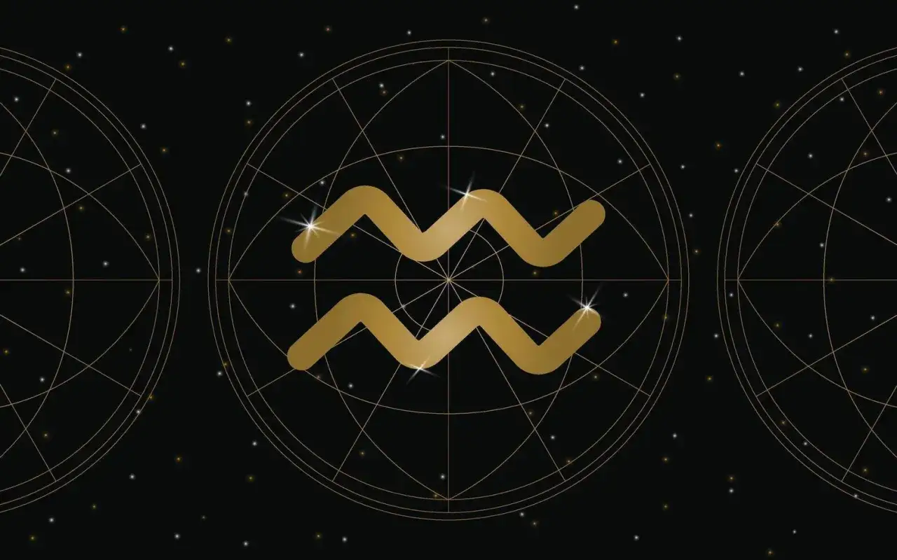 Złoty symbol Wodnika (Aquarius) na tle nocnego nieba z gwiazdami i siatką astronomiczną.