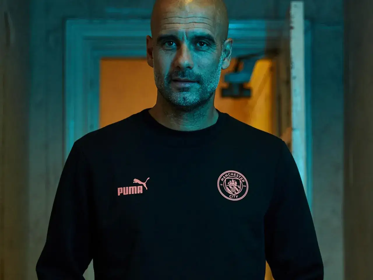 Pep Guardiola z logo Puma