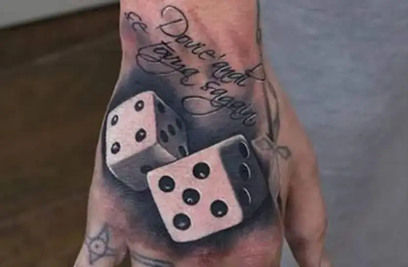 Zdjęcie Symboliczne znaczenie tatuażu kostki do gry - poznaj ukrytą prawdę