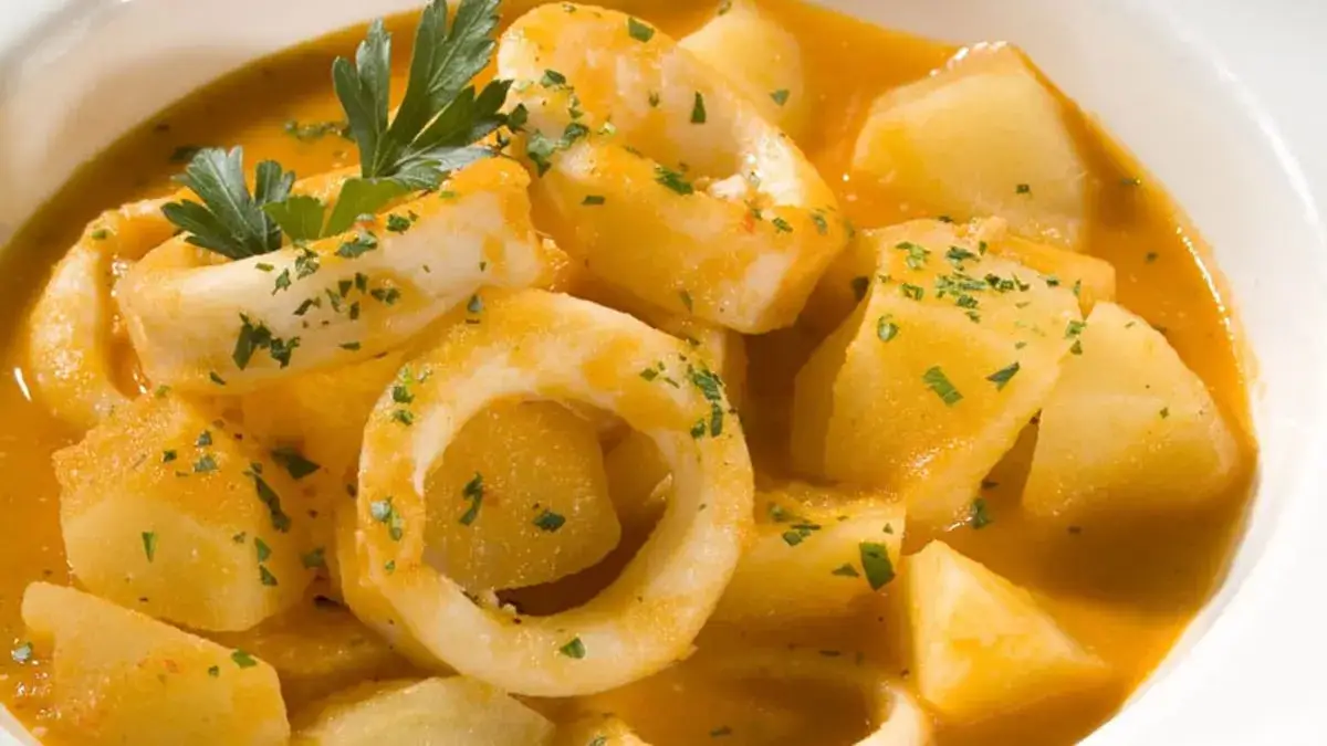 Zdjęcie Recetas irresistibles de patatas con calamares y gambas para disfrutar