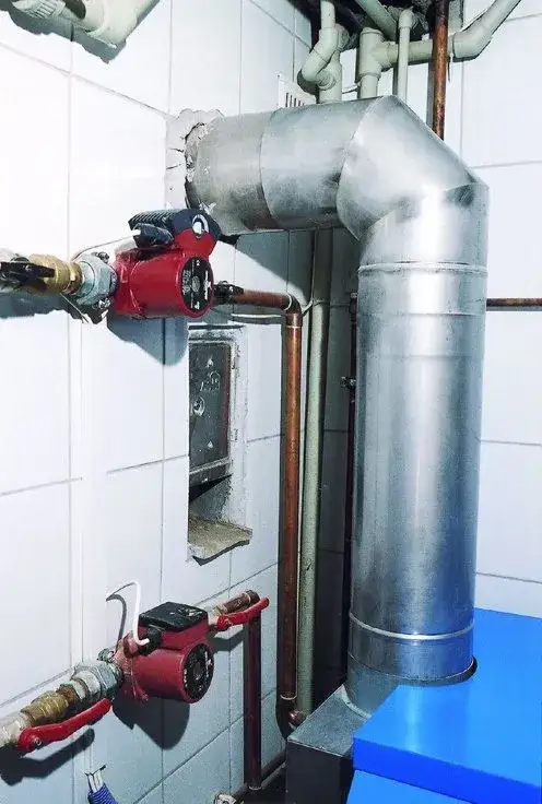 Zdjęcie Jak skutecznie uszczelnić rurę od pieca do komina i uniknąć problemów z wyciekami