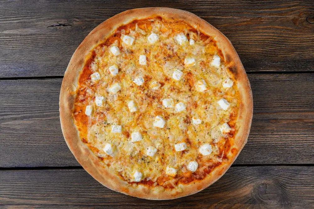 Zdjęcie Pizza 3 fromages parfaite : le guide ultime pour un d&eacute;lice fondant
