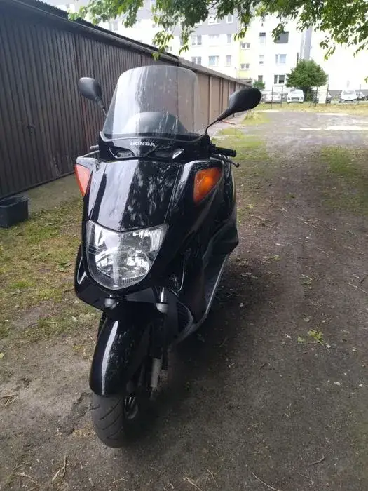 Zdjęcie Honda Pantheon 125 2t czy 4t - Co wybrać dla lepszej wydajności?