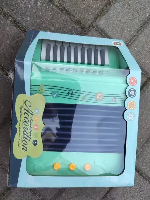 Zdjęcie Akordeon zabawka: rozwój dziecka przez muzykę i zabawę