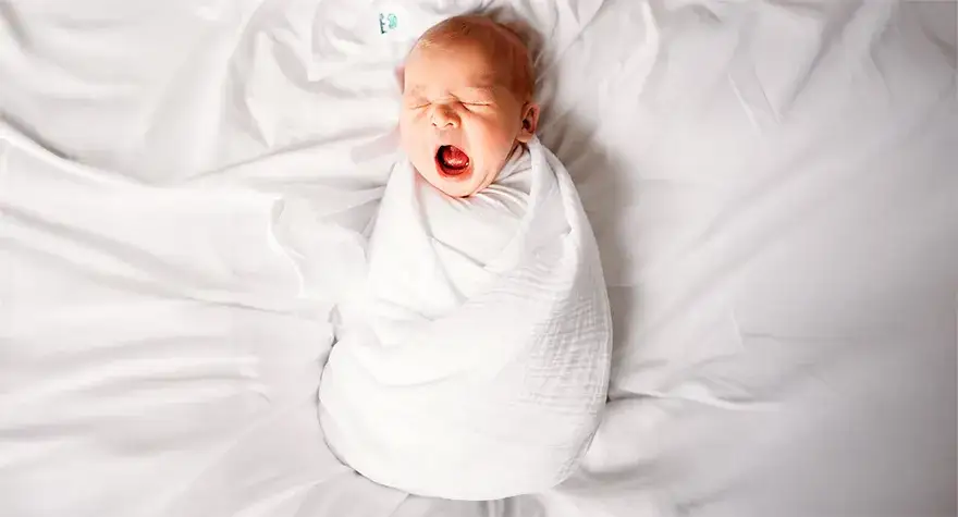 Zdjęcie Jak zawinąć dziecko w pieluchę tetrową, aby zapewnić mu komfort