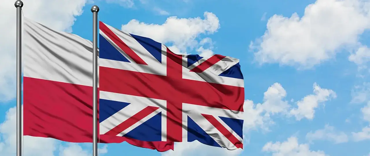 polski paszport i flaga wielkiej brytanii