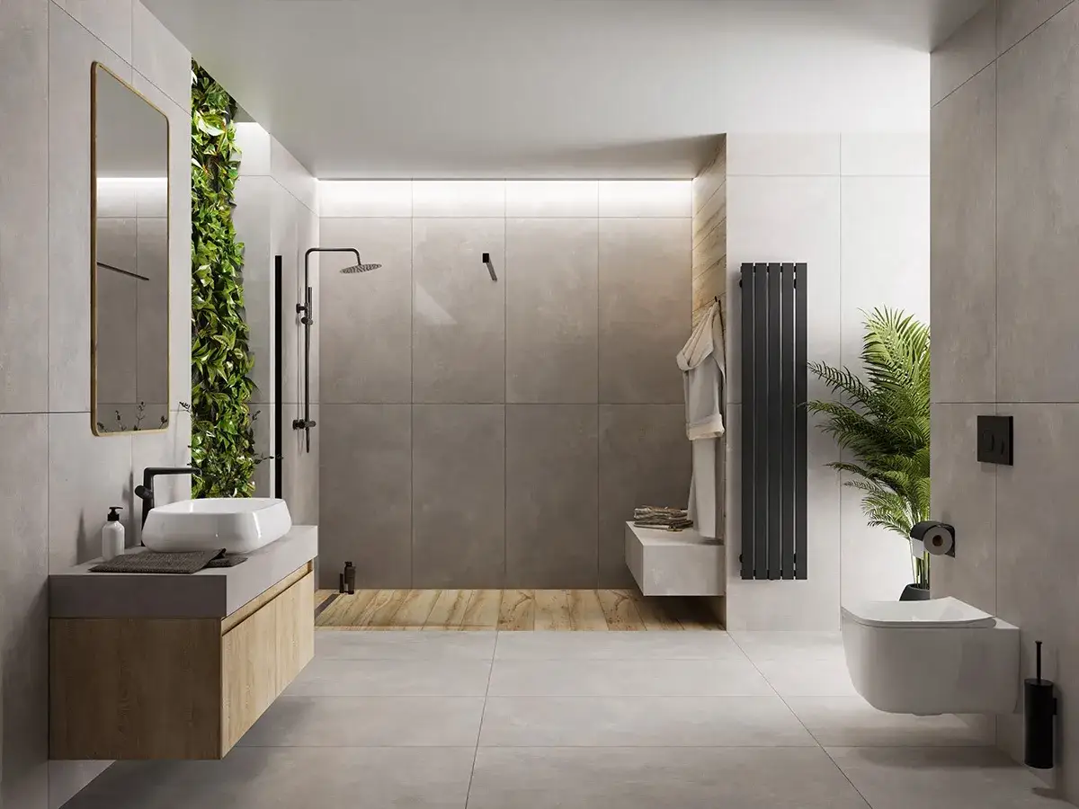 Nowoczesna łazienka z zieloną ścianą i betonem architektonicznym. Mikrocement w łazience tworzy minimalistyczną, elegancką przestrzeń.